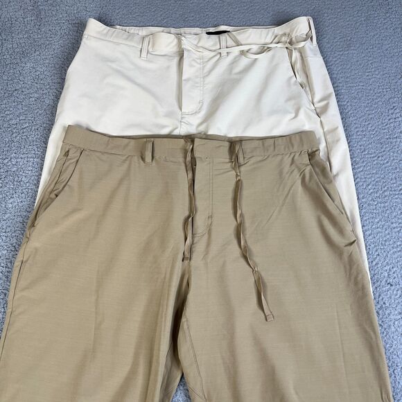 Lot of 2 Fabletics Chino Pants 41x32 Khaki Beige Cream Tapered Athleisure Hiking - Picture 1 of 16